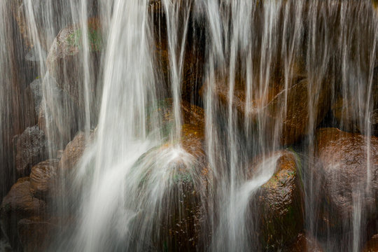 waterfall. downflow of water on stones