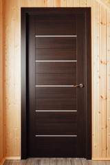 Obraz na płótnie Canvas brown wooden door inside of wooden house
