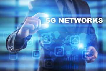 Businessman selecting 5g networks on virtual screen.