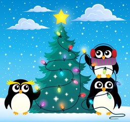 Penguins around Christmas tree theme 2