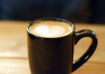 Cup of cappuccino with beautiful heart design