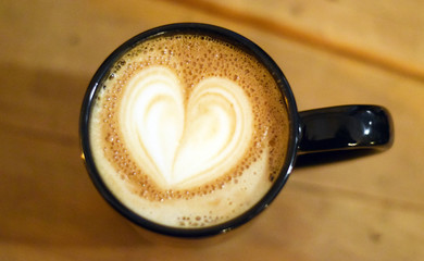 Cup of cappuccino with beautiful heart design