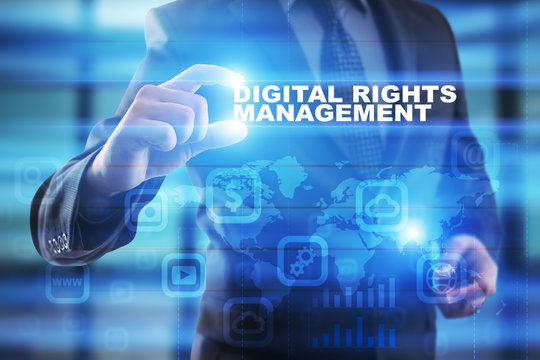 Businessman selecting digital rights management on virtual screen.