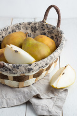 green pears in a basket
