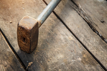 Old Pound Hammer place on plank , copy space