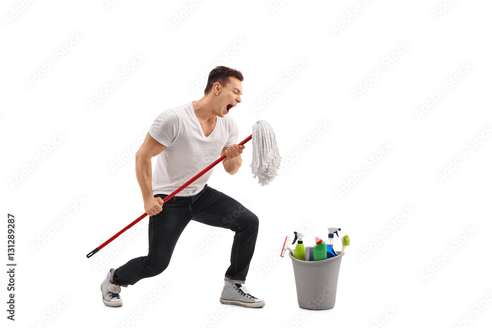 Canvas Prints Young man singing on a mop