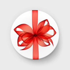 White Round Gift Box with Transparent Red Scarlet Bow and Ribbon Top View Close up Isolated on Background