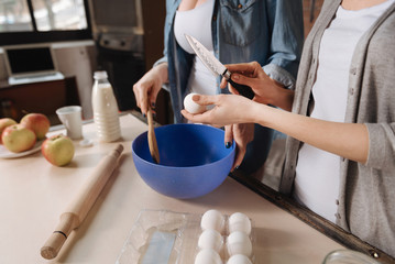 Close up photo of women during cooking process