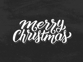 Merry Christmas hand lettering text on black chalkboard background. Vector vintage greeting card for Xmas