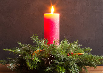 Candlestick made of fir branches, new year, christmas, handmade, selective focus, vertical
