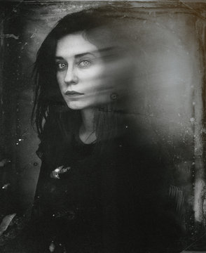 Old-fashioned blurred portrait of woman