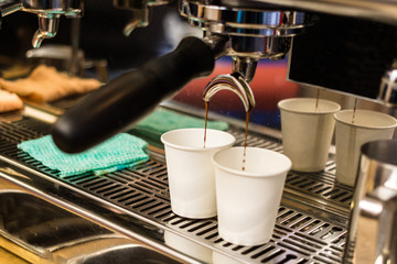 Close-up of espresso pouring from coffee machine