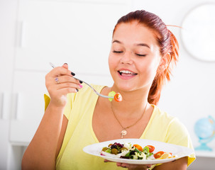 girl eating salad