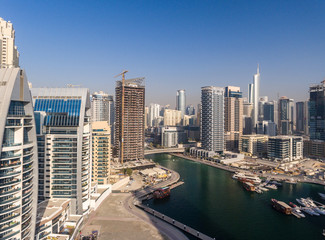 Fototapeta na wymiar Dubai Marina buildings and artificial canal, aerial view
