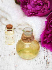 Peony flowers and massage oils