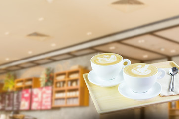 Two cups of hot coffee