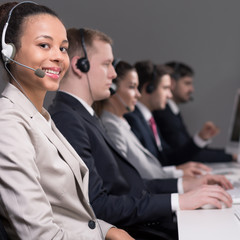 Call center agent with colleagues