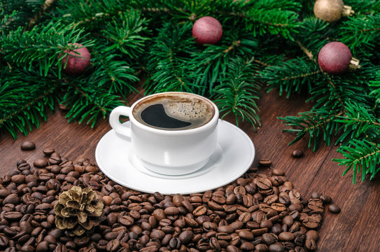 Hot coffee on christmas decoration.