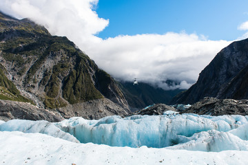 A helicopter approaching the Franz Josef Glacier in New Zealand