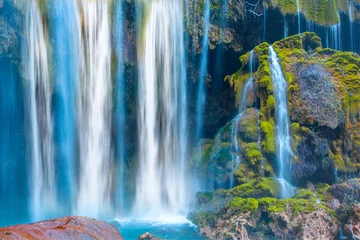 Foto op Plexiglas Amazing view of natural waterfall with crystal clear water among green woods in summer, Yerkopru © muratart