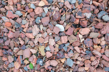 Abstract various pebble rock stones texture background with round pebble