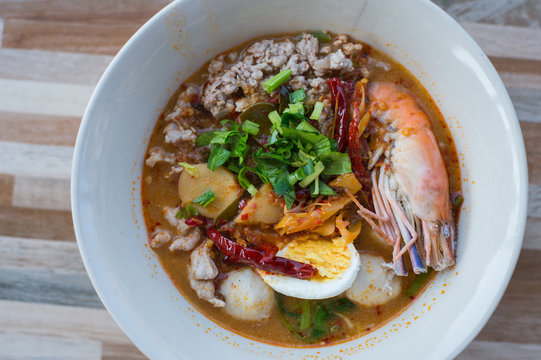 spicy prawn soup with egg or tom yum goong,Thai style.