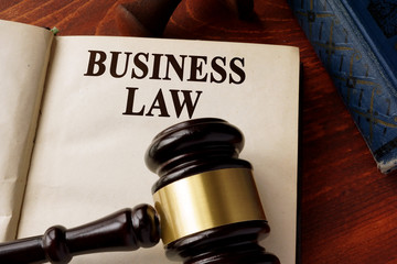 Book with title business law on a table.