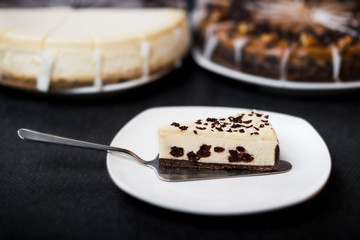 Slice of cheesecake on a white plate