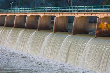 No drill blackout roller blinds Dam Strong stream of water at the hydroelectric dam