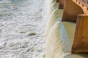 Strong stream of water at the hydroelectric dam