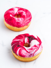 Tasty donuts on white background