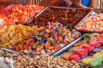 Sales of traditional Christmas sweets on fair.