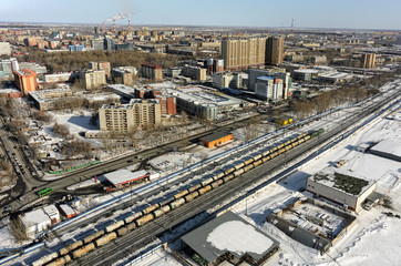 Tyumen, Russia - March 11, 2016: The railroad along 50 let VLKSM Street, dividing residential and industrial districts of city