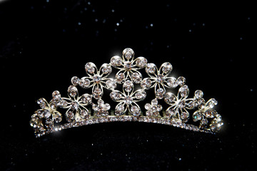 Crown, wedding tiara, diadem isolated on black background © Elina Leonova