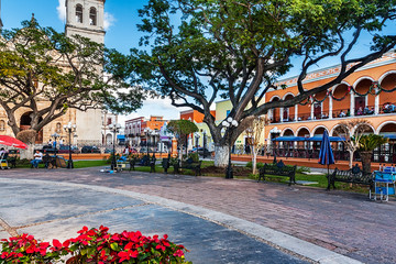 Park benches, the cathedral and colorful buildings in San Francisco de Campeche, Mexico