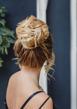 female upper high hairstyle for the wedding, unrecognizable rear view