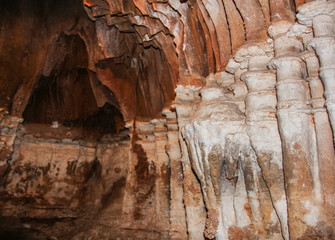 Fototapeta na wymiar Underground cave with stalactites and stalagmites.