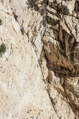 Rock climbers at Caminito del Rey path, Spain