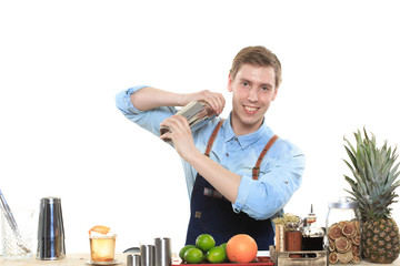 bartender with a shaker and bottle. behind the bar