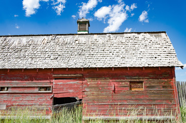 Weathered Old Red Barn western canada south facing