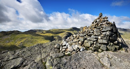 Cairn and walking poles