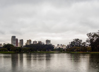 Fototapeta na wymiar Brazil, State of Sao Paulo, City of Sao Paulo, Cityscape viewed from the Ibirapuera Park.