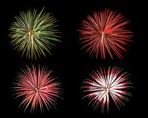 Fireworks of various colors isolated on black background