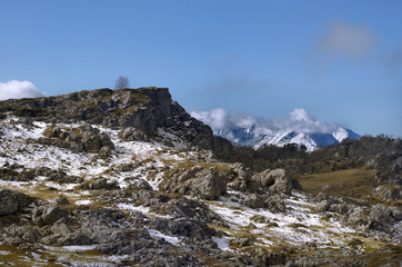 Mountain view away from the foreground of the stones.