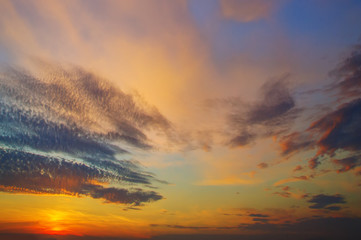 nice sunset with dark and with colorful clouds