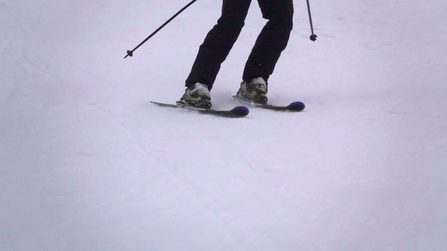 Skier slides down the slope, slow motion