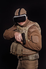Fototapeta premium Portrait soldier or private military contractor holding rifle.