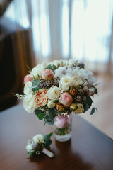 beautiful bridal bouquet lying on the table