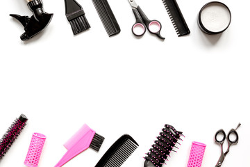 Tools for hair styling on white background top view