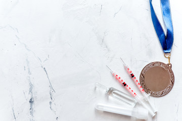 Concept of doping in sport - deprivation medals top view